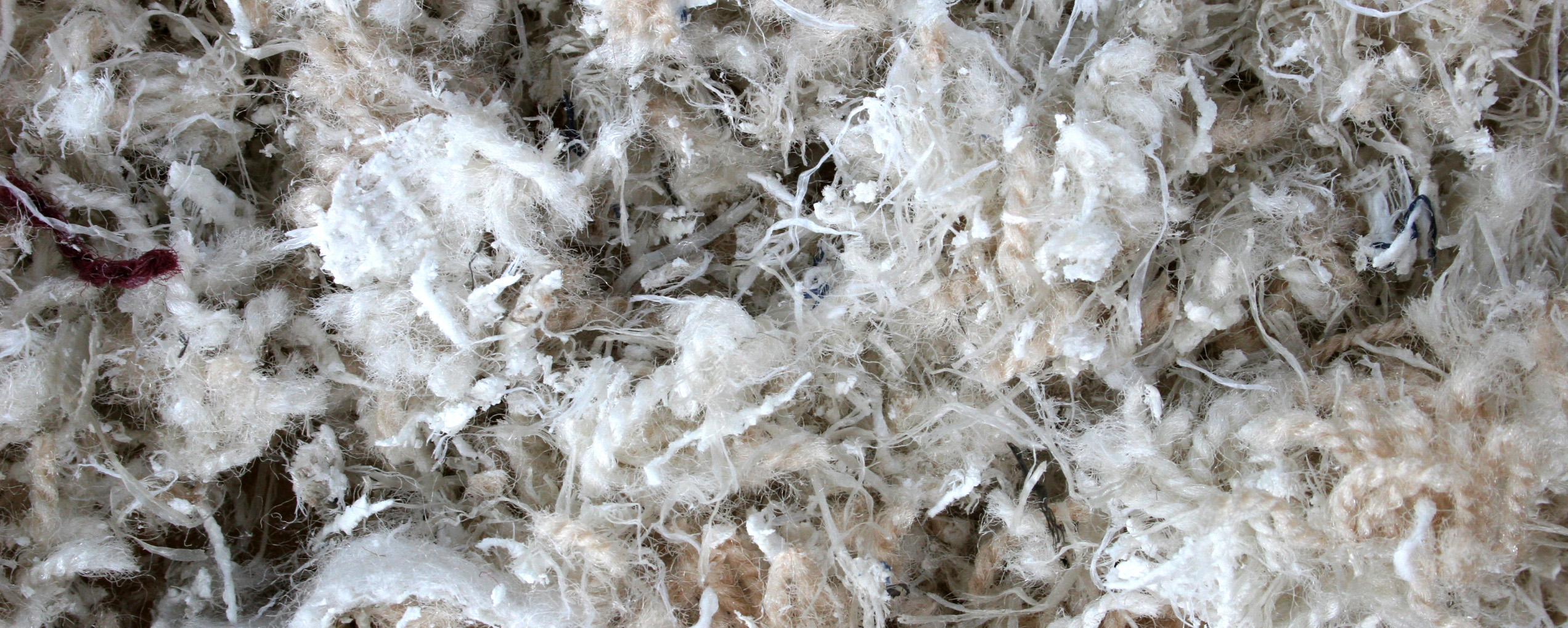 carpet scraps bulk Closeup of shredded carpet scraps for recycling