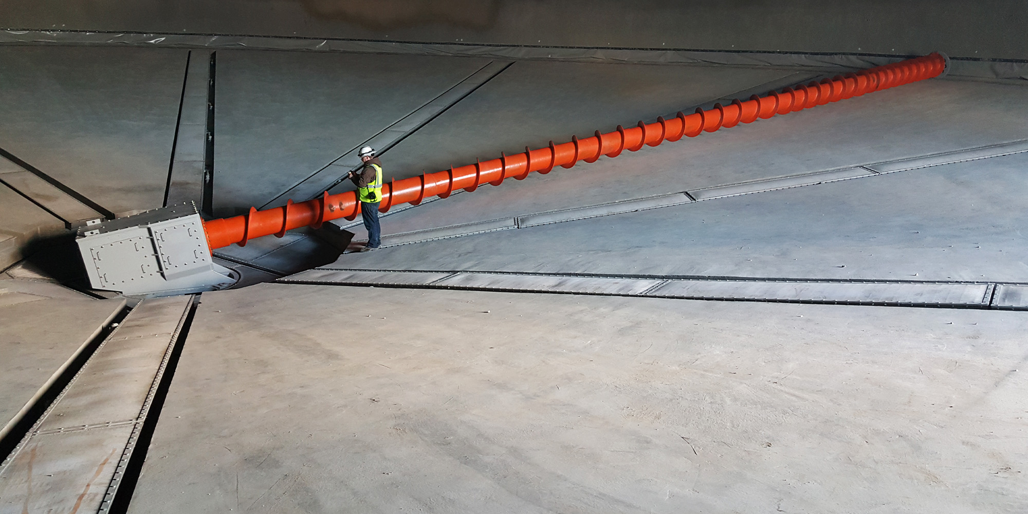 Laidig Fluidized Screw Reclaim System bulk material handling system, bridging, rat-holing, material flow, reclaim, reclaimer, silo unloading, unloader, bulk material storage, reclaim system, dry bulk unloading, fluidized floor, cement, aggregate, concrete