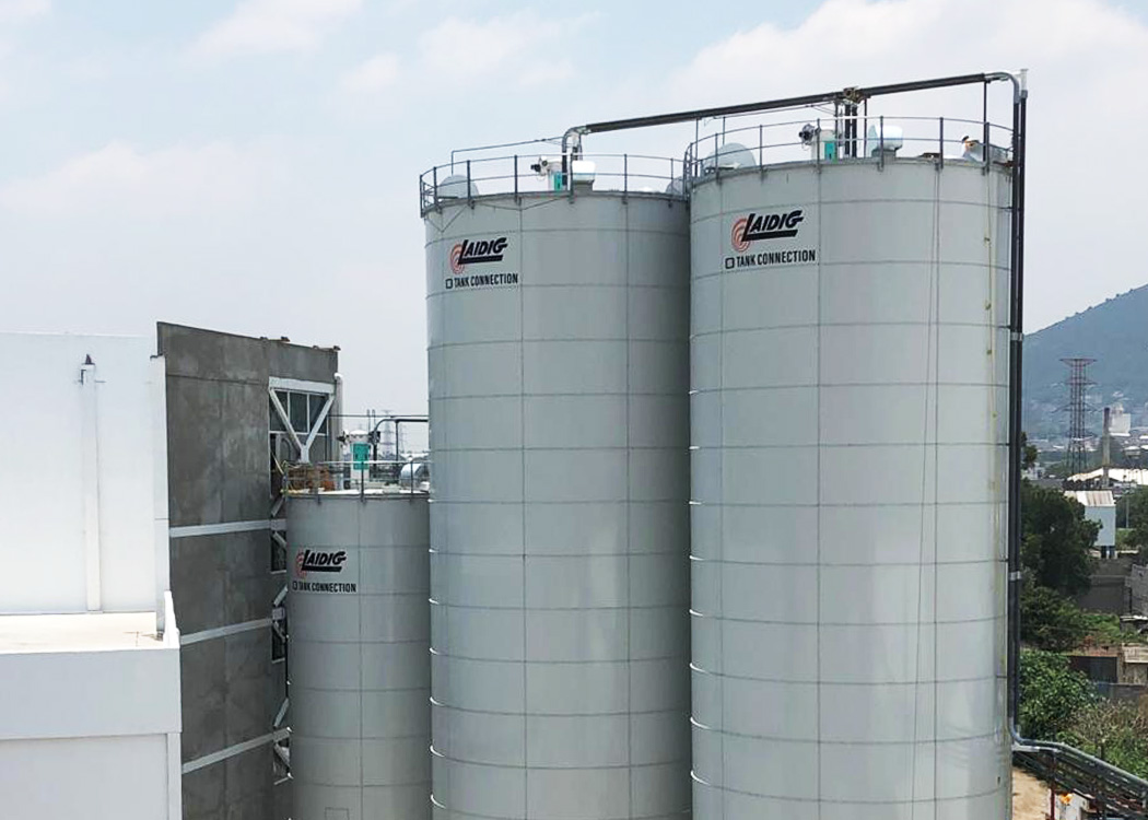 Three Laidig silos at milling company in Mexico bulk material handling system, bridging, rat-holing, material flow, reclaim, reclaimer, silo unloading, unloader, bulk material storage, reclaim system, dry bulk unloading, grain unloading, grain handling, flour milling, wheat bran, pellets